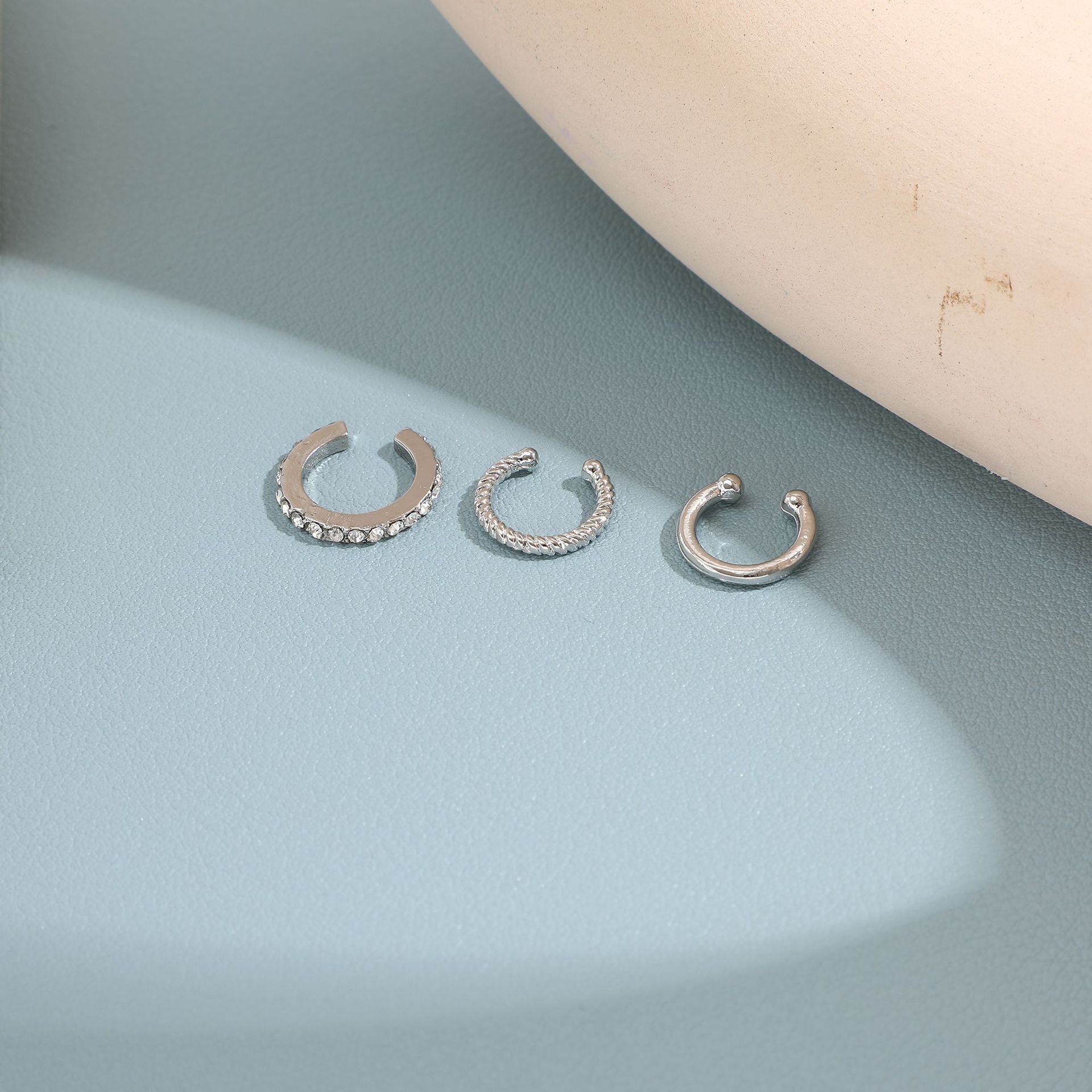 Lightweight clip-on earrings designed for sensitive and non-pierced ears, offering comfort without sacrificing style