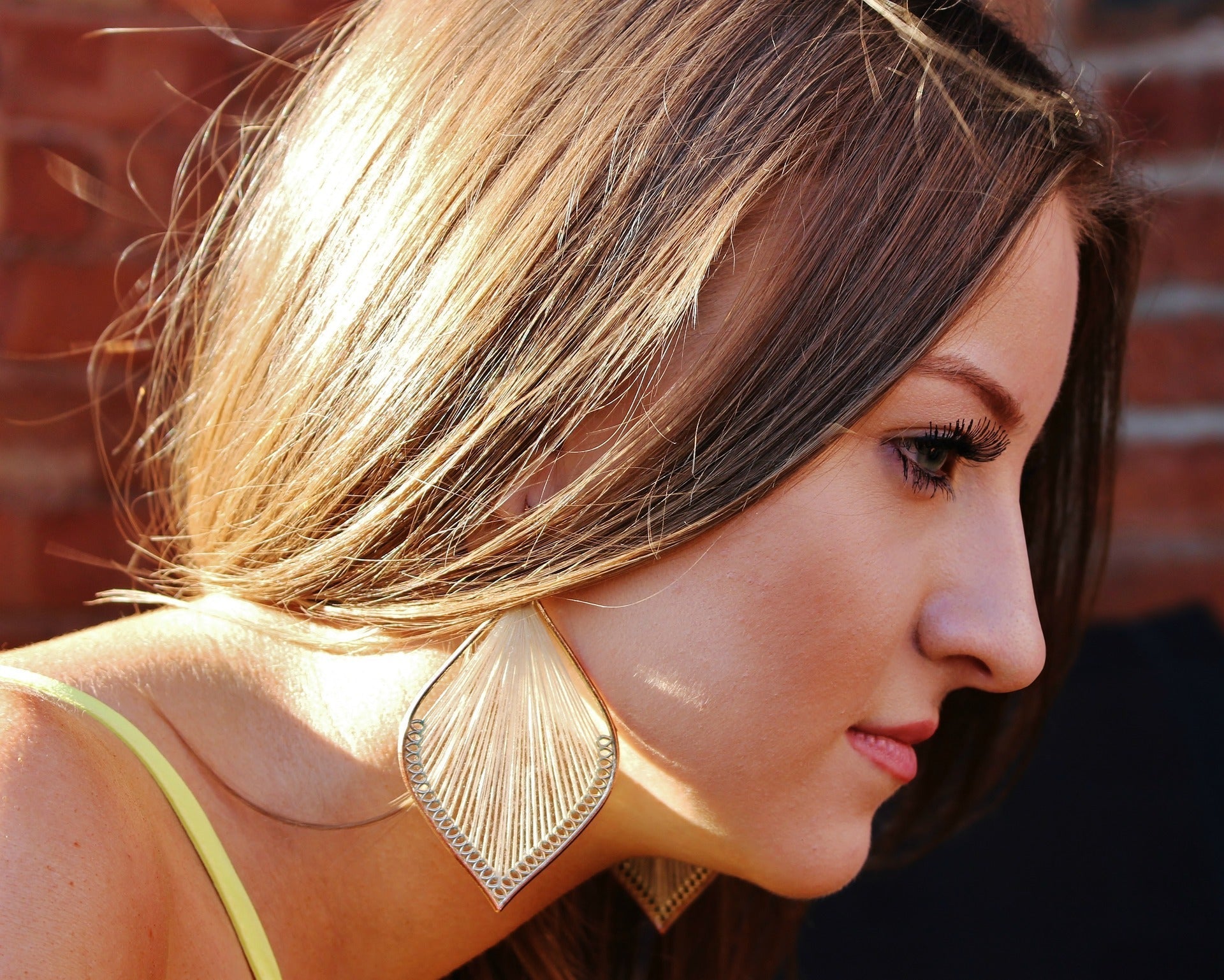 AEVUM minimalist durable earrings styled for Seattle rainy city life and Pacific Northwest fashion 2026