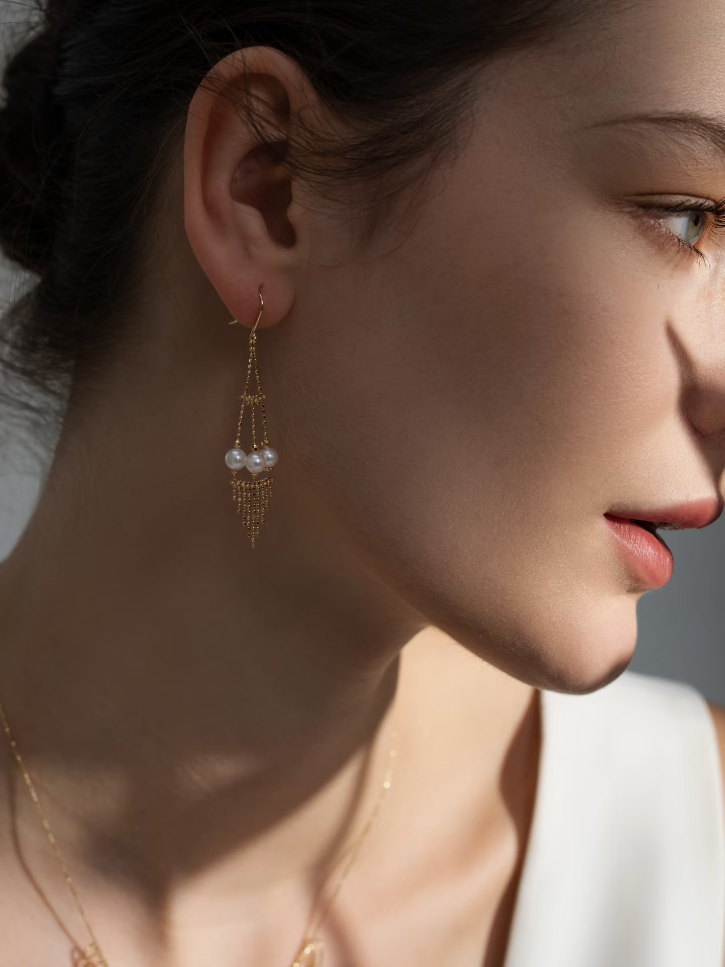 Light-catching gold drop earrings styled for Instagram, representing LA minimalist jewelry trends in 2026