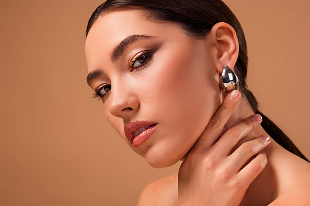 AEVUM S925 silver pearl stud earrings for Miami summer 2026 – hypoallergenic waterproof jewelry