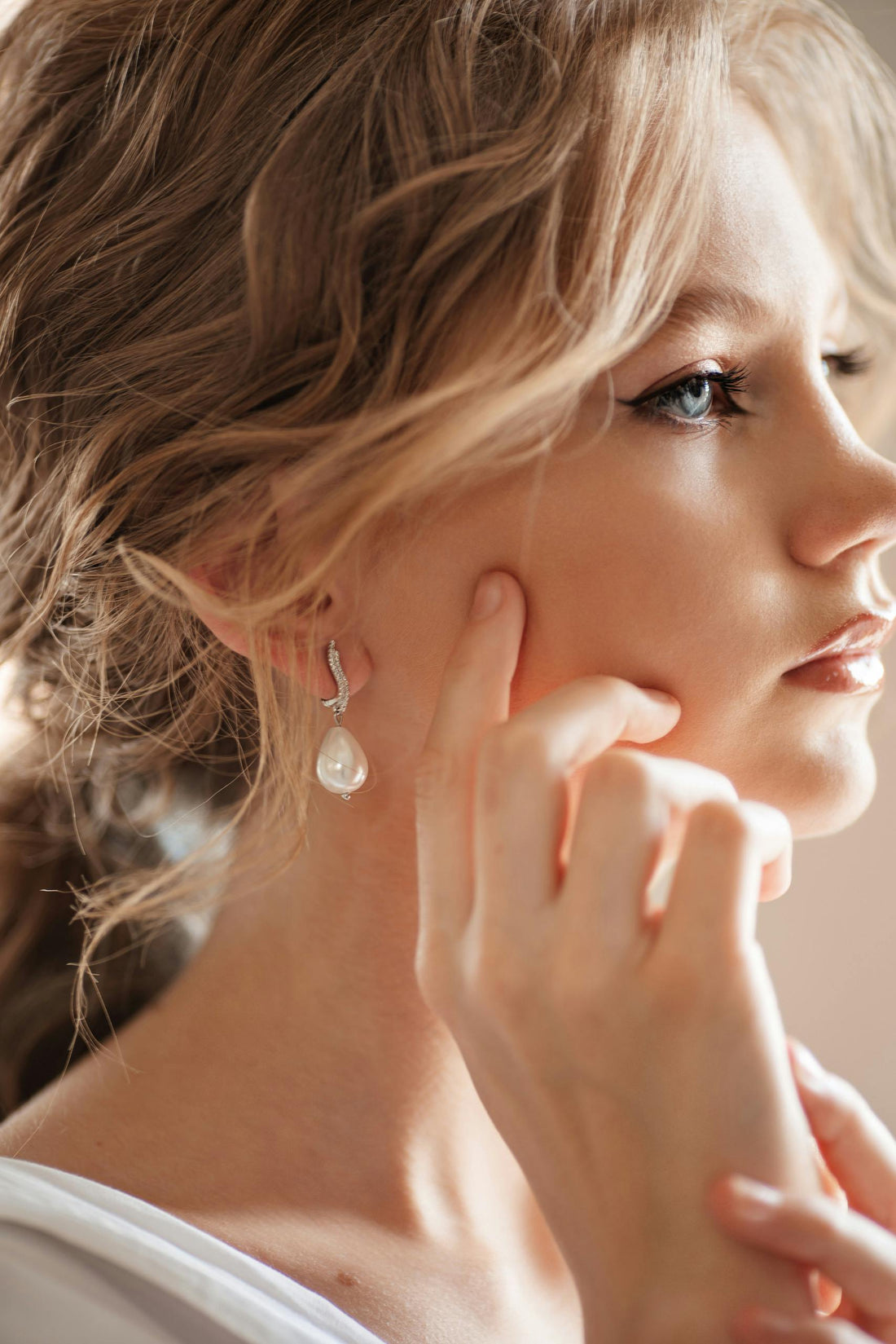 minimalist gold earrings and pearl jewelry flat lay 2026 fashion trend