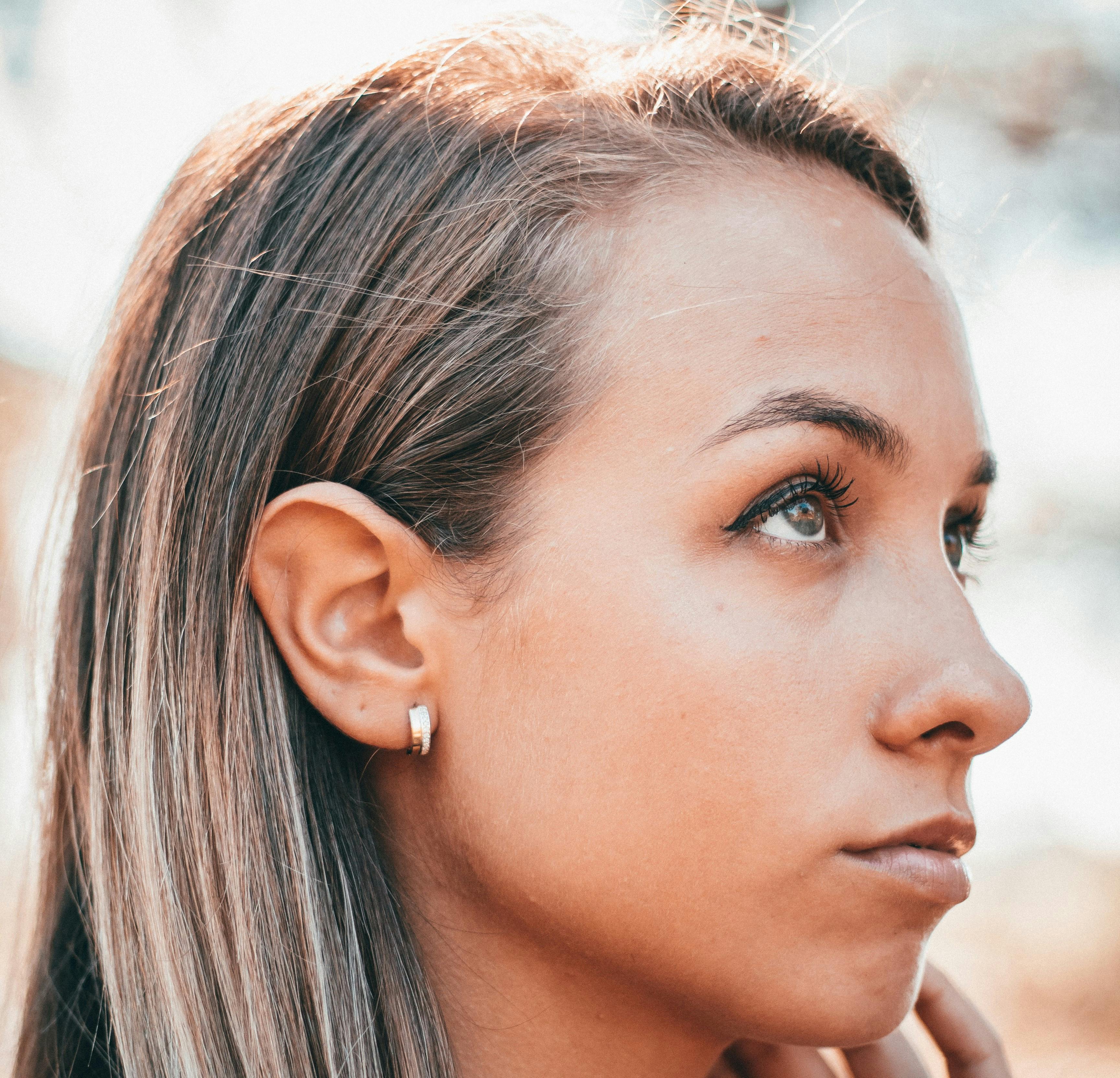 Hypoallergenic earrings for sensitive ears — sterling silver and titanium styles by AEVUM 2026