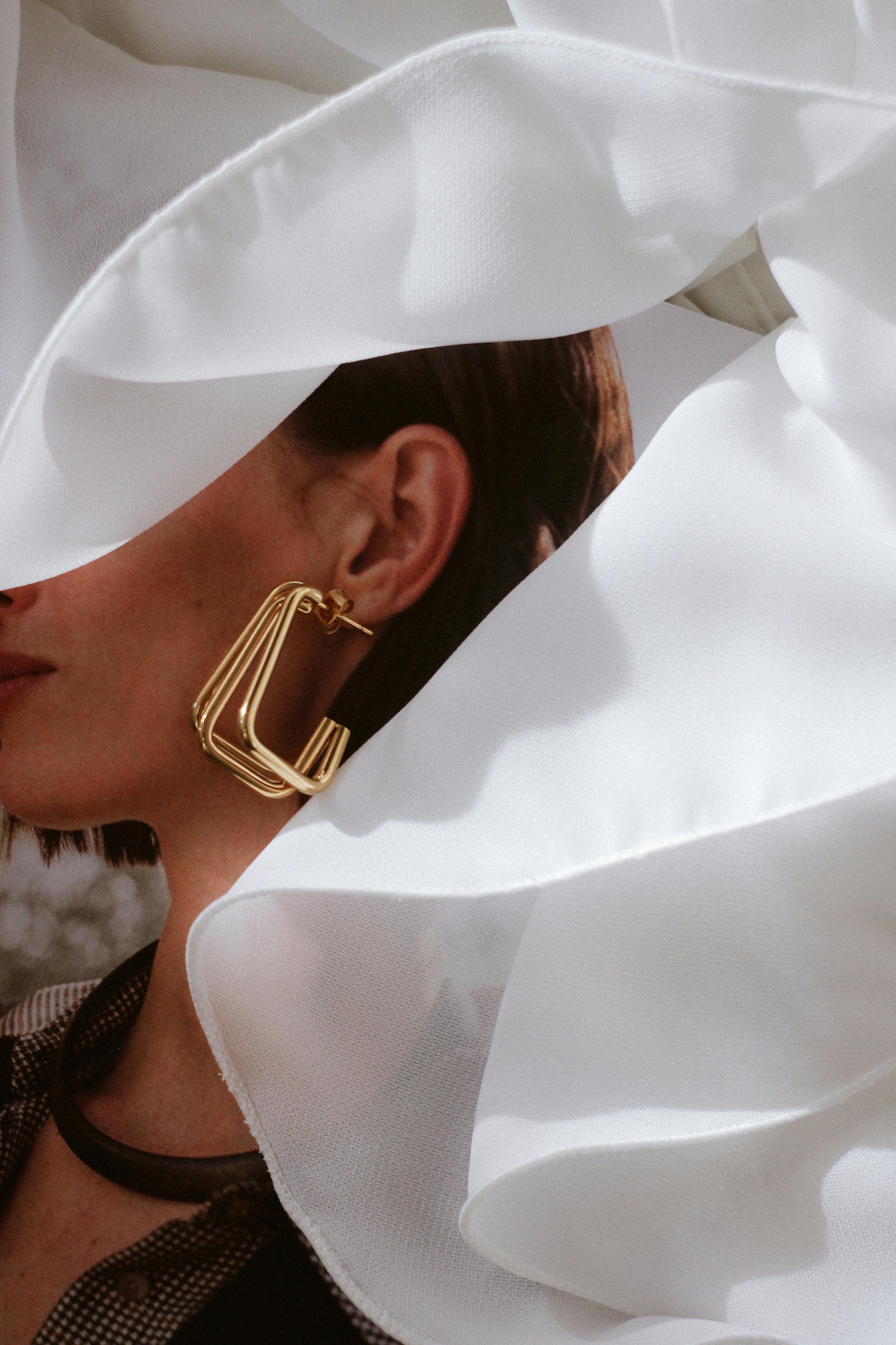 Best earrings for small face shapes — minimal proportional styles by AEVUM for Vancouver women