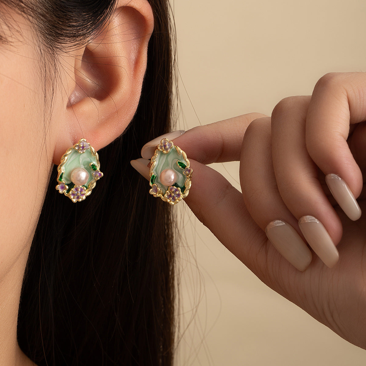 Monet Garden green purple enamel pearl earrings worn on ear